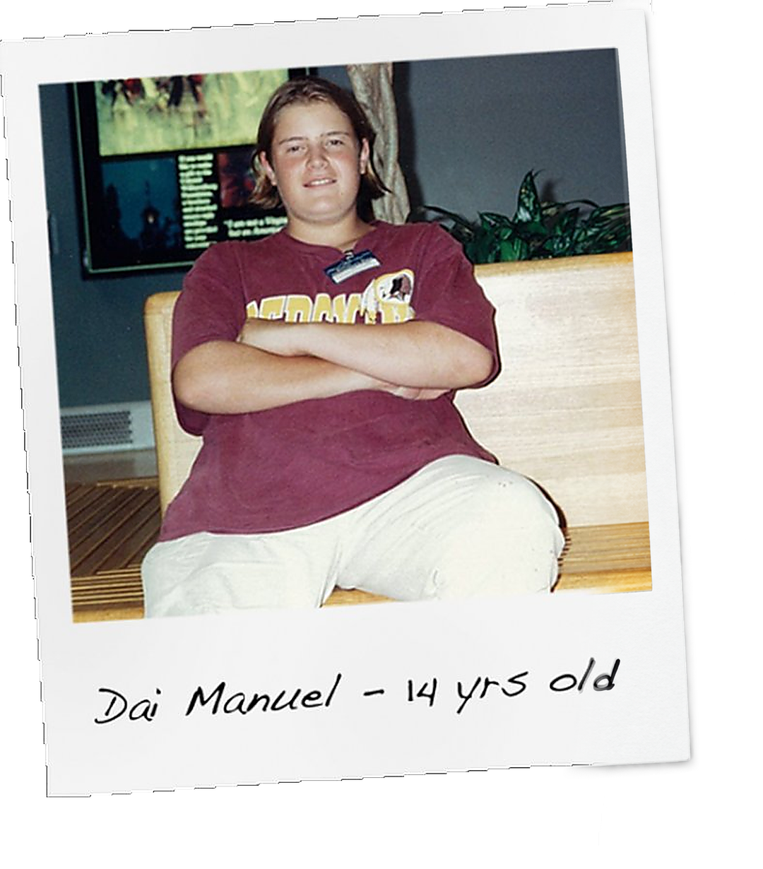 Dai at fourteen, over 250 pounds, sitting with his arms crossed